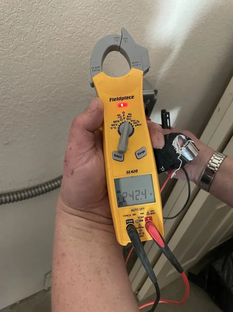 Voltage testing with clamp meter during Generator Installation in Strawberry